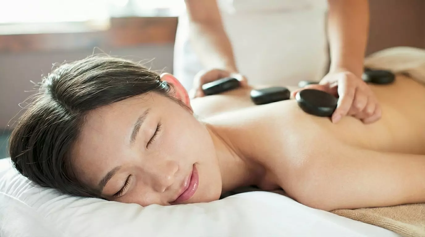 Hot Stone & Body Therapy Package: Massage, Scrub, Oils, or Gua Sha at U Young Aesthetic Center (Up to 32% Off)