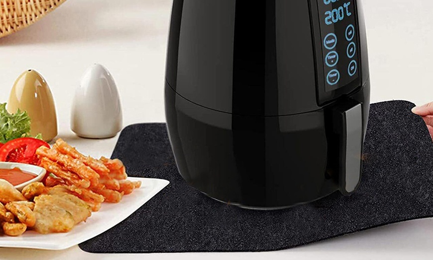 Image 4: Two-Piece Heat-Resistant Countertop Protector Mats for Air Fryers