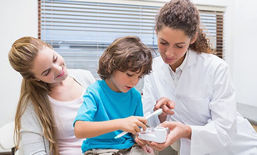 Image 6: Dental Check-Up & X-Rays w/ Optional Clean & Fluoride Treatment & More