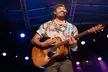 Michael Franti & Spearhead w/ Tanks and the Bangas on August 15 at 7:30 p.m. - Second Medium