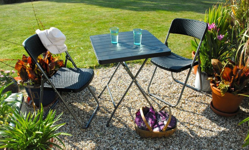 Image 11: Foldable Plastic Table and Chair Set Collection
