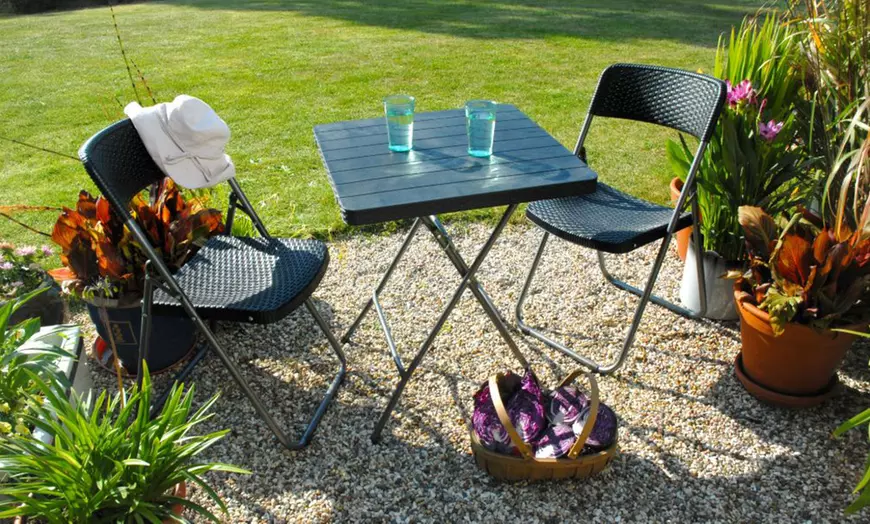 Image 11: Foldable Plastic Table and Chair Set Collection
