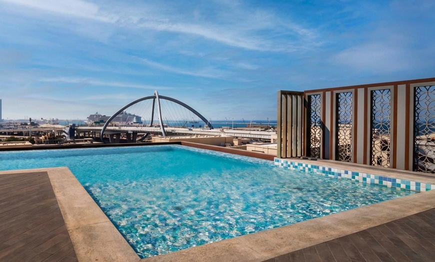 Image 8: Breakfast Buffet w/ Beverages & Pool Access for 1 Child or 1-4 Adults