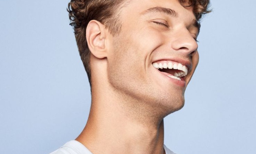 Image 8: Scale and Polish with a Choice of Laser Teeth Whitening at Denticare