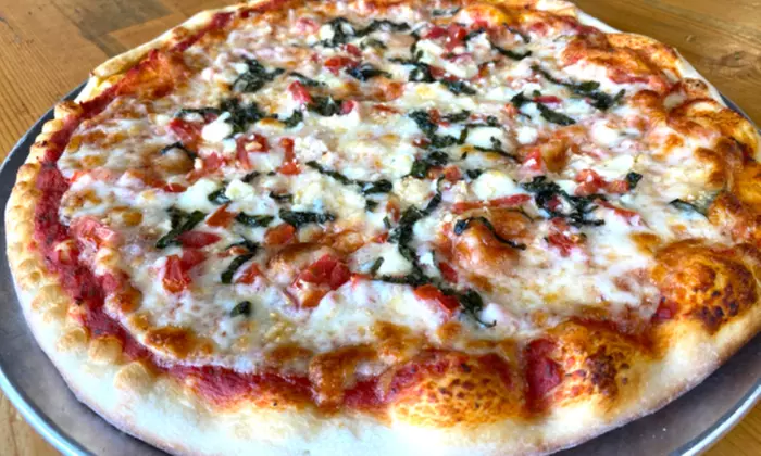 12-, 16-, or 18-Inch Specialty Pizza, or Food and Drink at Sexy Pizza (Up to 30% Off) - Primary Image
