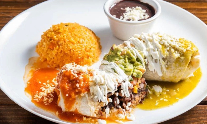 Image 17: Vibrant Rooftop Dining: Choose Meals, Margaritas, or Dining Credit