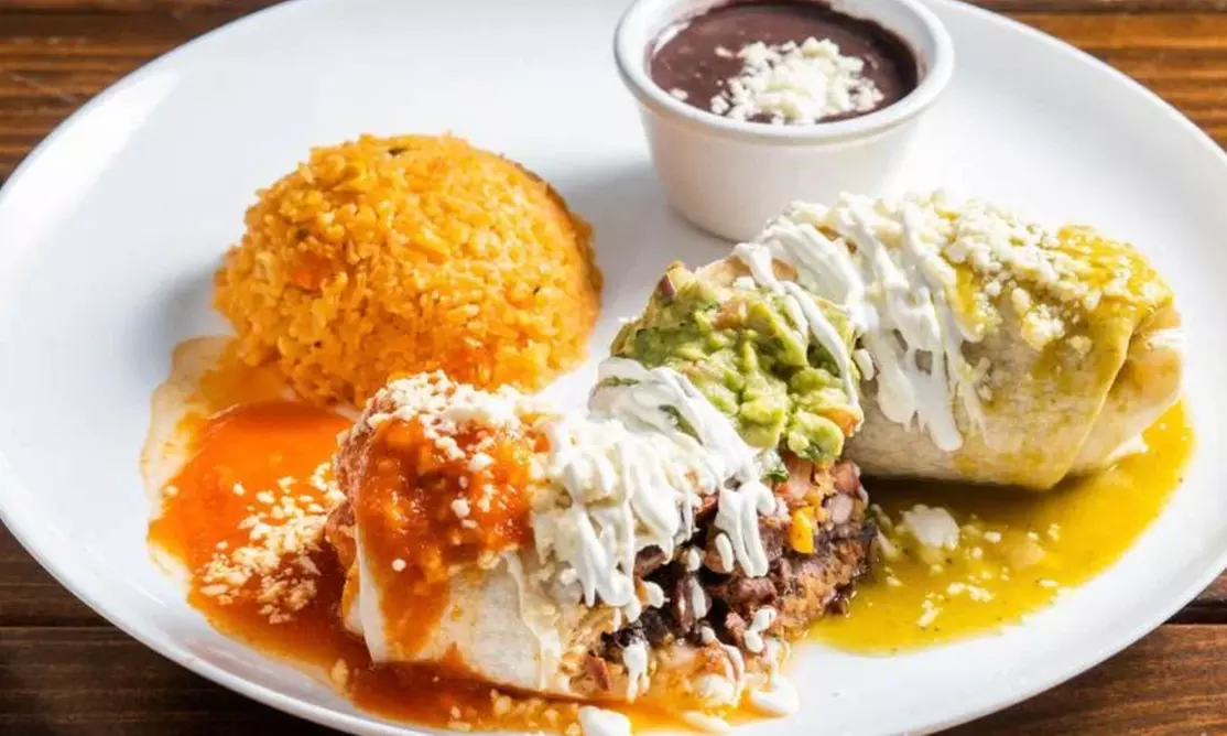 Vibrant Rooftop Dining: Choose Meals, Margaritas, or Dining Credit