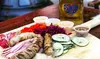 Hearty German Eats & Drinks: Boards, Pretzels, Wurst, Beer Boots at Prost! (Up to 43% Off)