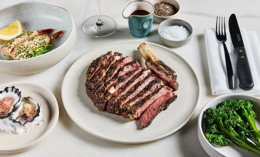 Image 1: Indulge in Three-Course Gourmet Dining for Two or Four w/ Wine Pairing