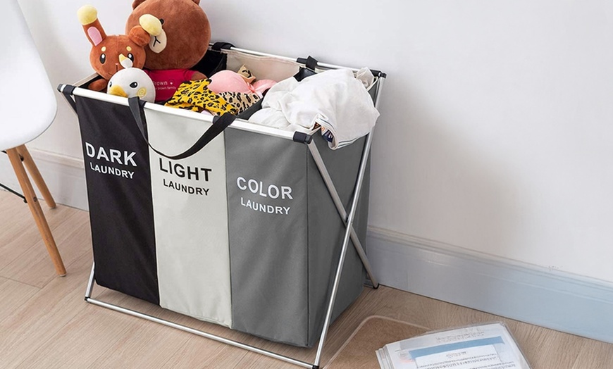Image 1: 145L Foldable Three-Section Laundry Basket
