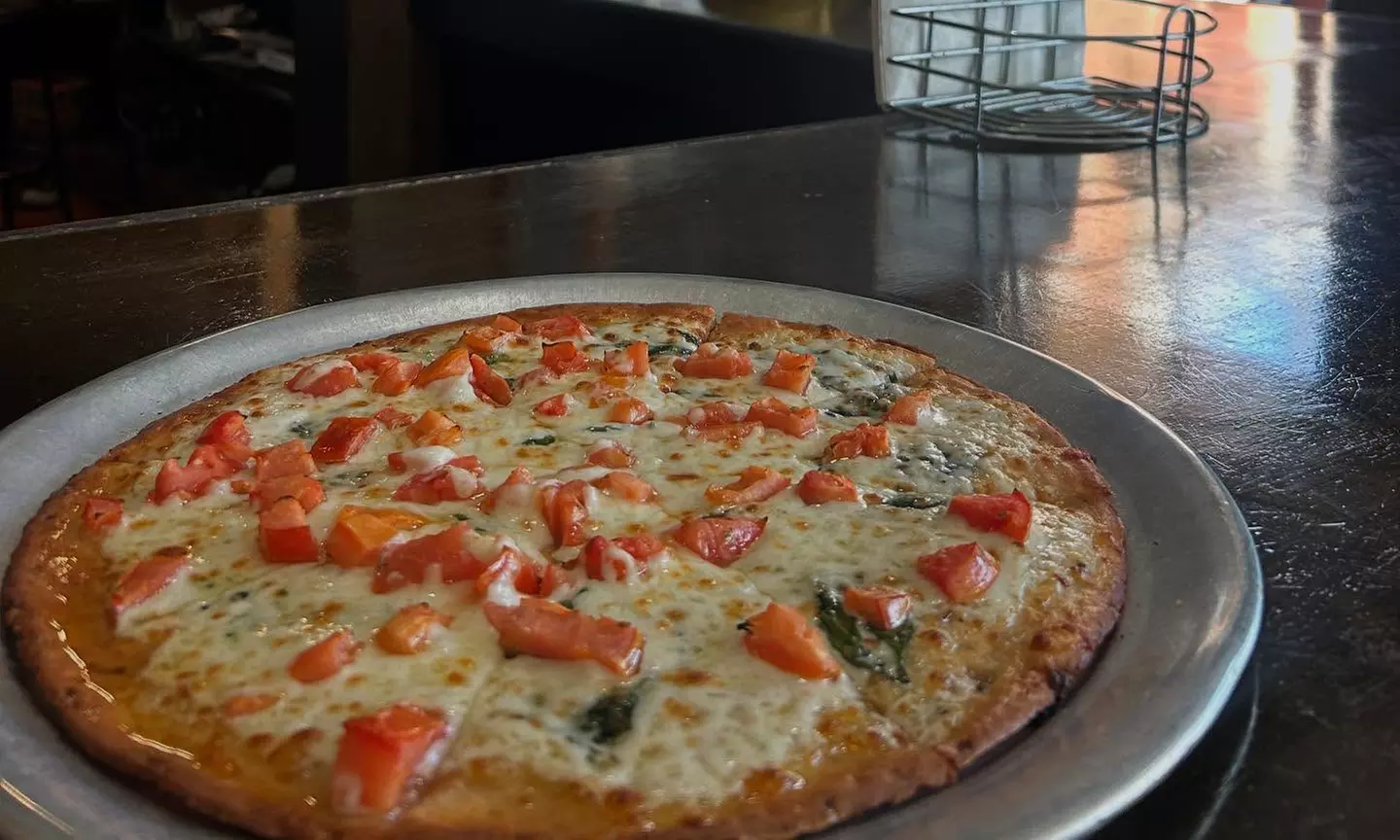 Enjoy Artisan Pizza, Specialty Sandwiches, Salads, Wings & Great Beers