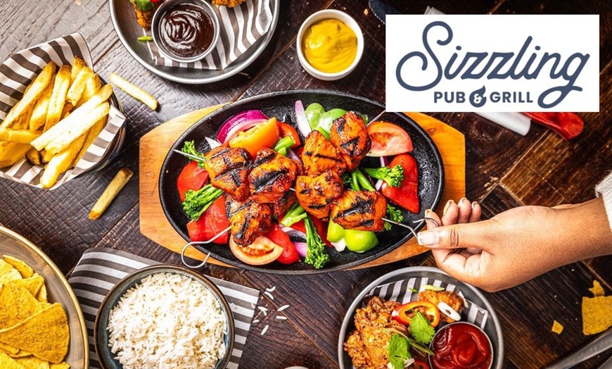 Image 1: Skillets and Small Plates at ⭑★ Sizzling Pub & Grill ★⭑