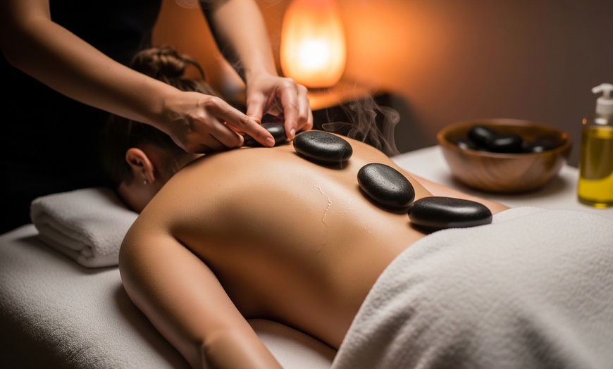 Image 2: 30, 45 or 60-Min Hot Stone Massage with Organic Oil or 75-Min Package