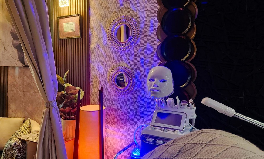 Image 2: Glowing Skin: Signature Facial w Glow Blissful Hand & Foot Treatment!