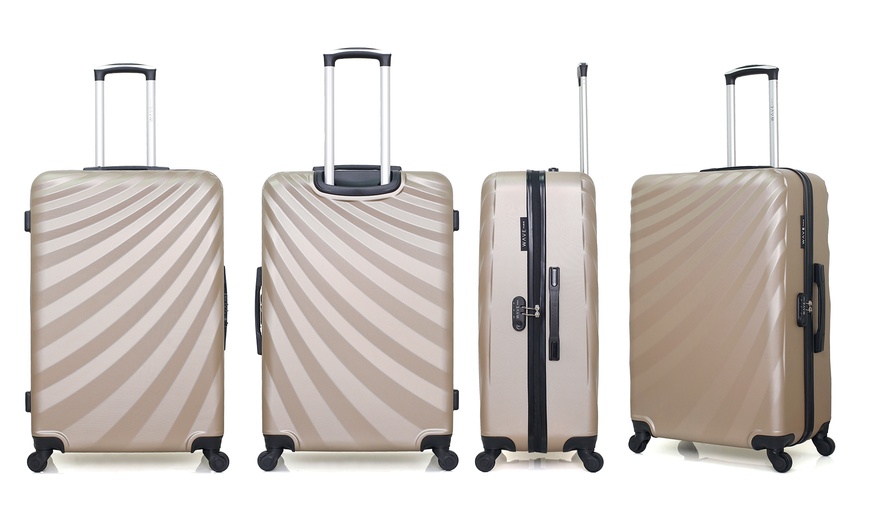 Image 23: Valise en coque rigide de la marque Wave Paris et Hero