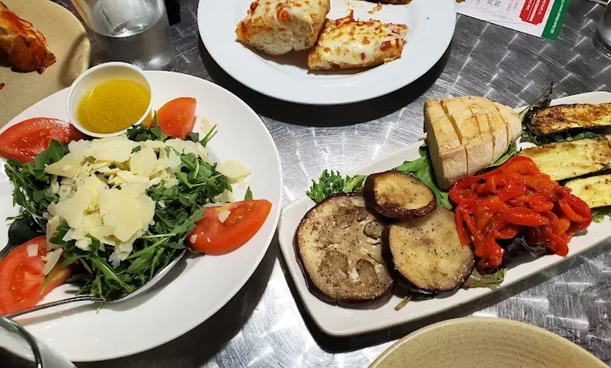 Image 1: Satisfy Cravings with $40, $60 Toward Food and Drink or Holiday Dinner