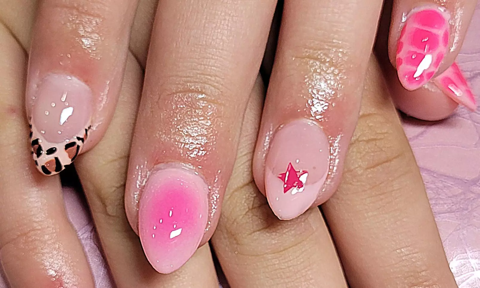 Gel Mani, Exfoliating Gel Pedi, or Hard Gel Enhancements