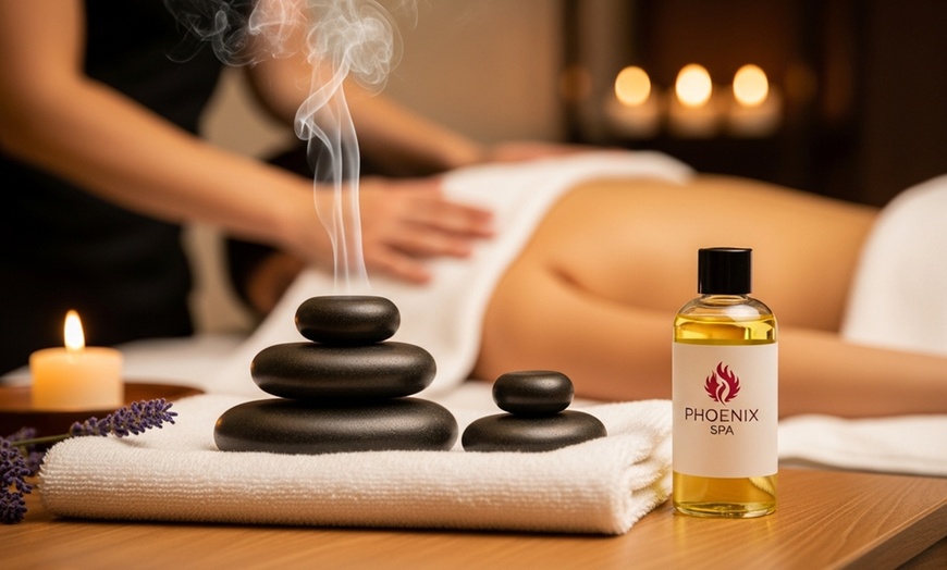 Image 1: Up to 63% Off on Relaxing massage at Phoenix Spa