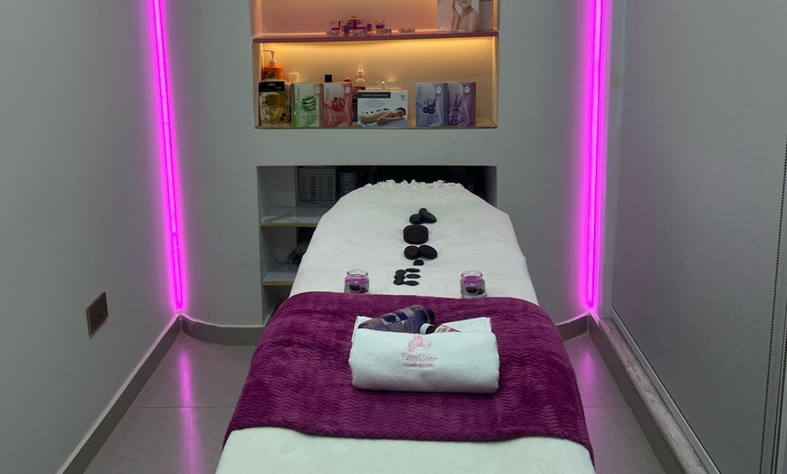 Image 1: Relaxing Choice of 45-, or 60-Min Thai and Hot Stone Body Treatments
