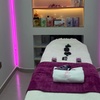 Image 1: Relaxing Choice of 45-, or 60-Min Thai and Hot Stone Body Treatments