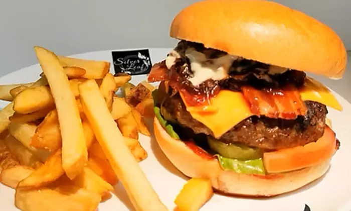 Enjoy a Two Course Meal + Wine or Soft Drink for One, Two, or Four