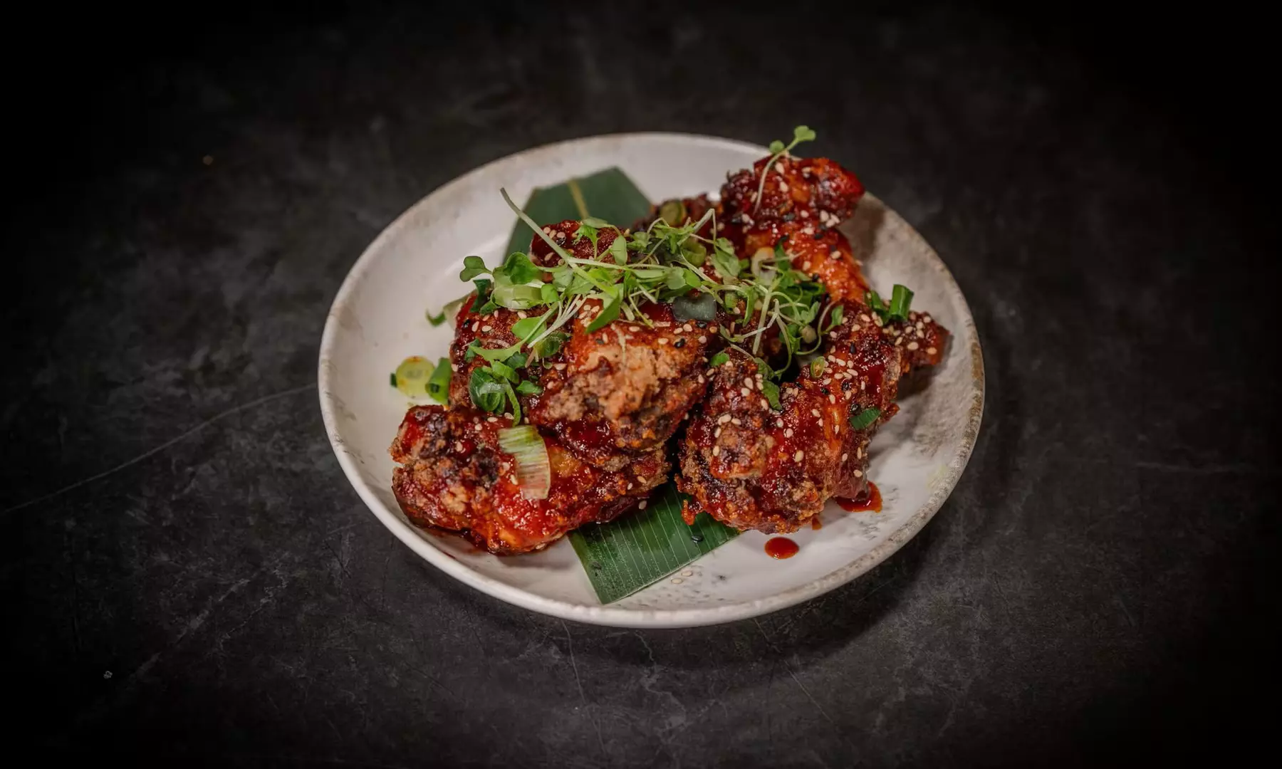 Savor Bao Buns, Sides, and Drinks for up to Four!