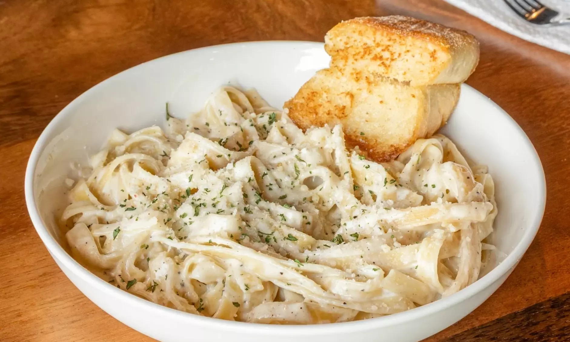 $50, $75, or $100 Dining Credit | Dozen Wings, Fries, Entrees, & More