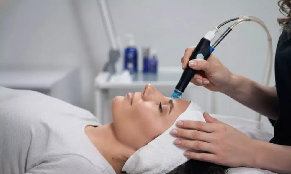 Experience Signature or Deluxe HydraFacial sessions with LED Light Therapy for clearer, brighter skin, up to 67% off - Primary Image