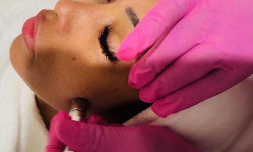 Image 6:  50-Min Swedish, Deep Tissue, Hot Stone Massage, Facial & More 