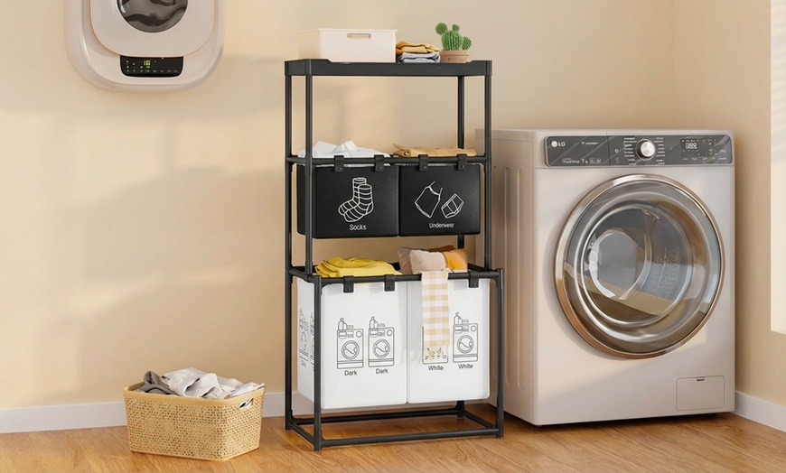 Image 2: Panier à linge design 3 compartiments avec étagère intégrée