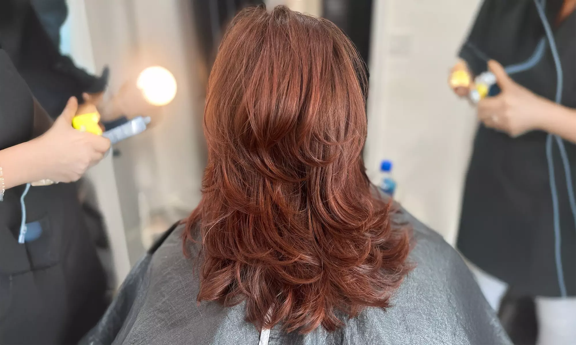 Transform with a Blow Out, Women’s Haircut, or Glossing package