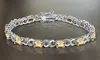 Genuine Citrine Gemstone and Diamond Accent Infinity Link Bracelet