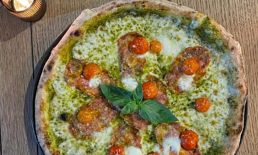 Image 4: Savor the flavors with 25% off on stone-baked pizzas