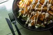 $25 or $50 Towards Food and Drink or Full/Half Sandwich + Chips or Fries & More @ Schnitzi (Up to  27% Off) - Second Medium