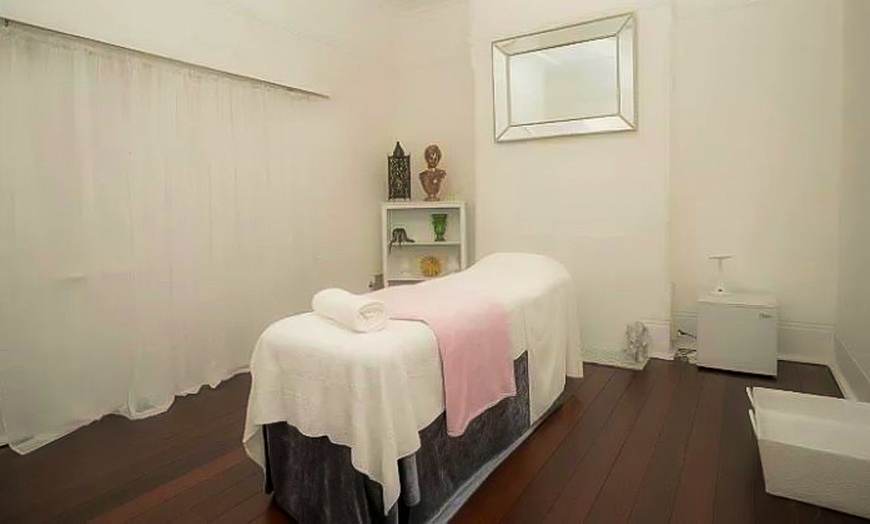 Image 3: 30-Min Massage, 60-Min Facial/ Brow & Lash Tint, or Body Scrub Package