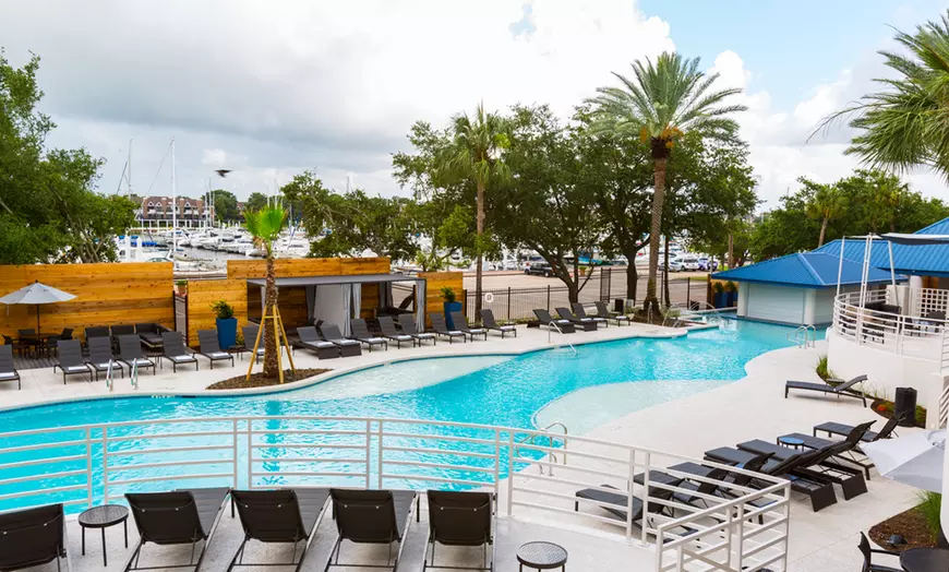 Resort-style outdoor pool with swim-up bar