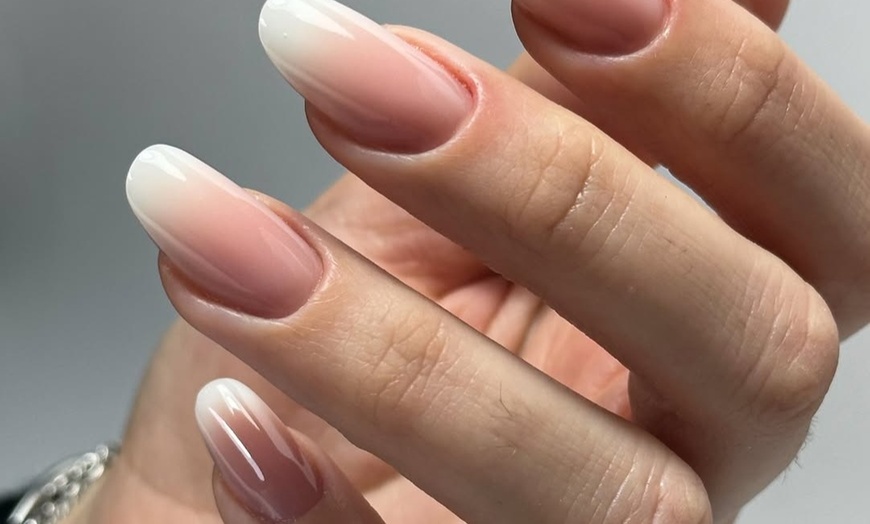 Image 10: Relax with a Deluxe Manicure and Pedicure Experience!