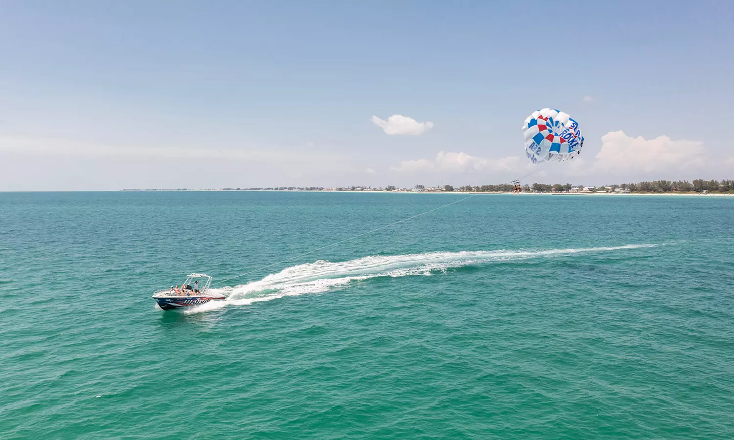 Enjoy a 10-12-Min Parasailing Experience with Sea Rocket Adventures!