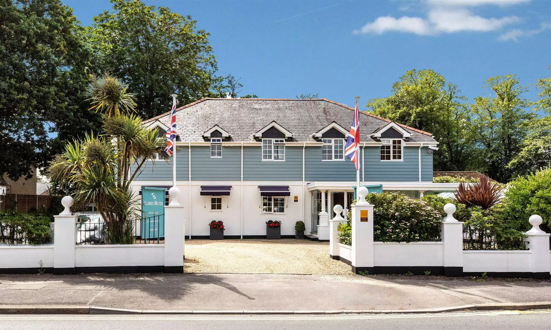 2 or 3-Course Sunday Roast with Wine or Prosecco for Two or Four at The Lord Bute Hotel & Restaurant ( 42% Off) - Primary Image