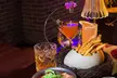 Delight with Dinner for Two, Four or Six with Cocktails at Wonderland Bar (Up to 50%Off) - Second Medium