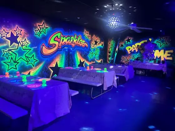 Glide into Fun: Sparkles Family Fun Center Admission with Skate Rental
