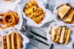 One, Two, or Four Traditional Cheesesteaks with a Large Fry, Drinks, and a Medium Ice Cream (Up to 34% Off) - Second Medium