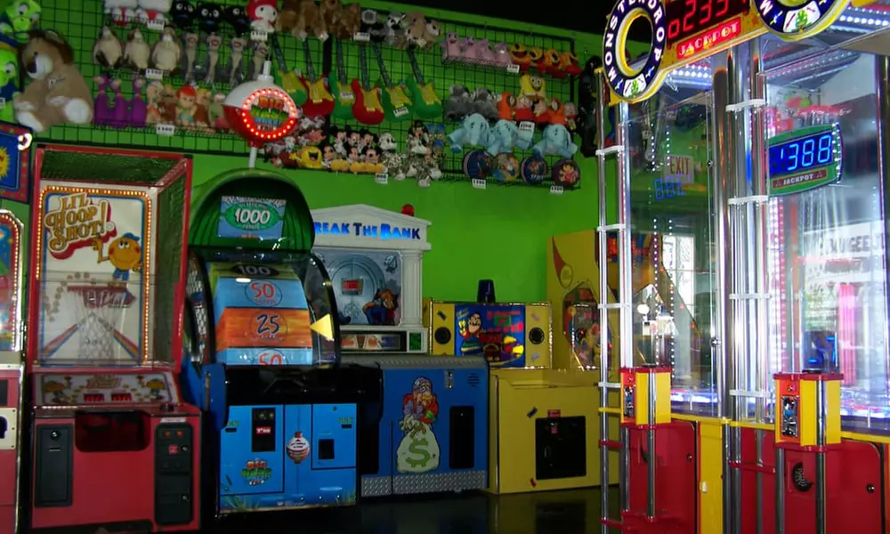 Unlock Arcade Fun at Zig-E’s Funland: 45 or 90 Credits, Popcorn & Fountain Drink for One Person (Up to 56% Off) - Second Medium