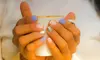 Mani or Pedi 3.1, 3.2, or 3.3-Acrylic Natural, Volcano Calming, & More at Spa Tastic Blue Nails (Up to 37% Off)