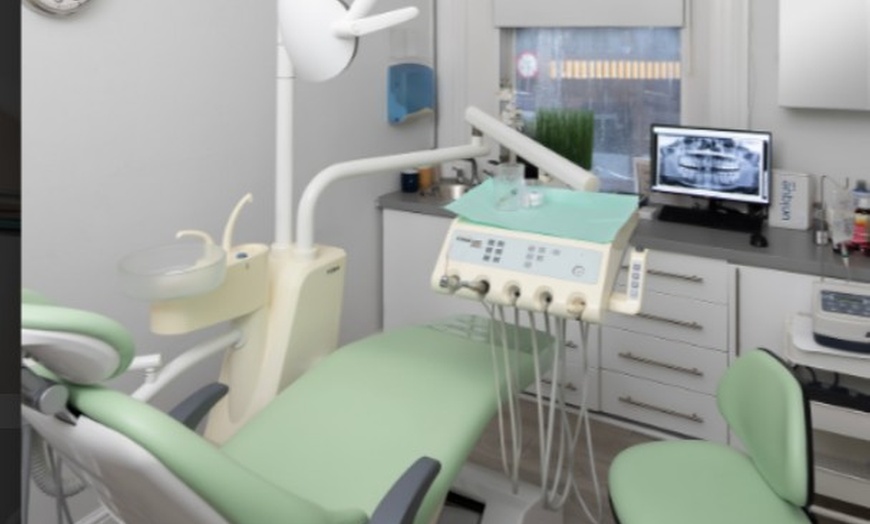 Image 4: Scale and Polish with a Choice of Laser Teeth Whitening at Denticare