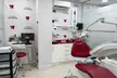 Higiene dental con ultrasonidos, flúor y diagnóstico o curetaje periodontal 1 o 2 arcadas con 83% de descuento - Second Medium