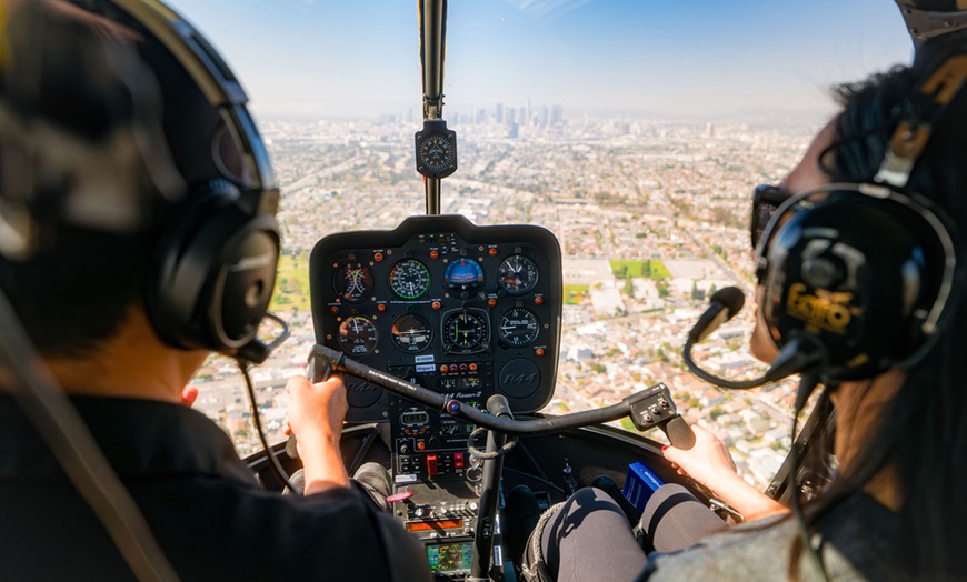 Image 1: Pilot Experience in an R22 or R44 Helicopter