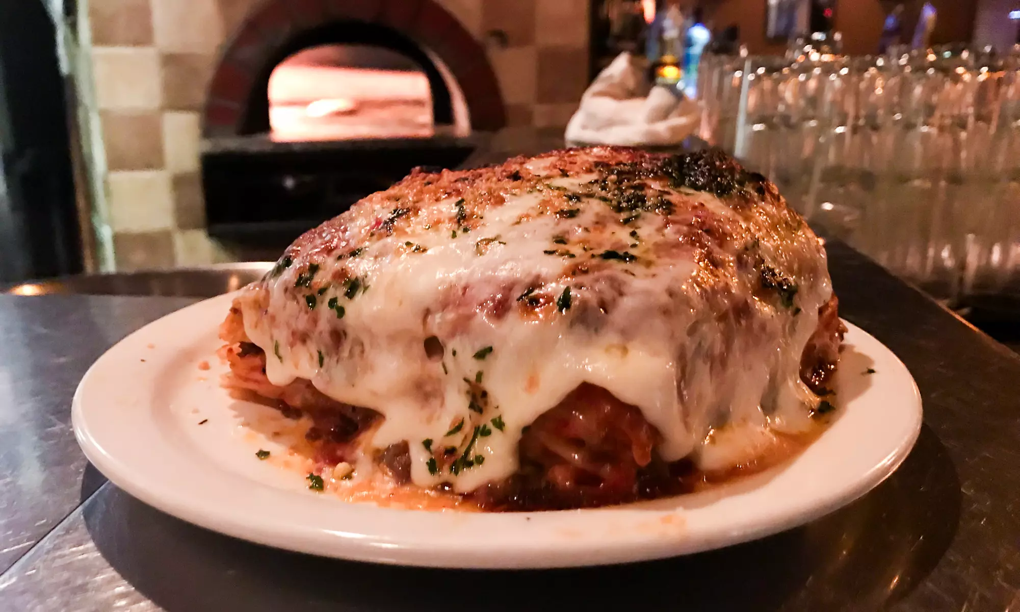Trattoria Arrivederci offers $30 worth of Italian food in Phoenix with cozy dining options, up to 50% off. - Primary Image