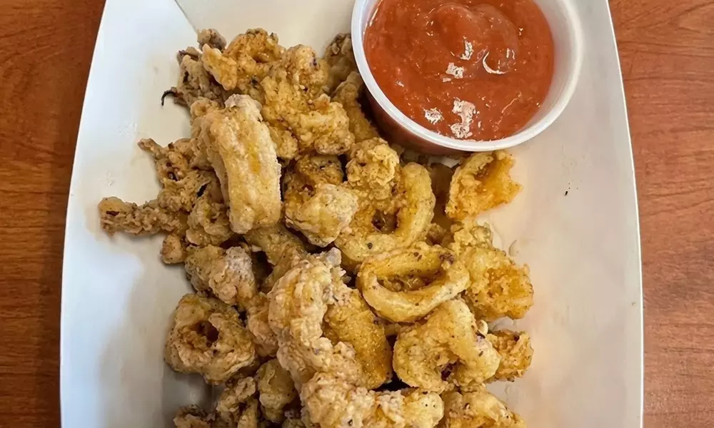 Fish and Chips Dinner with Chowder Fries and Drinks