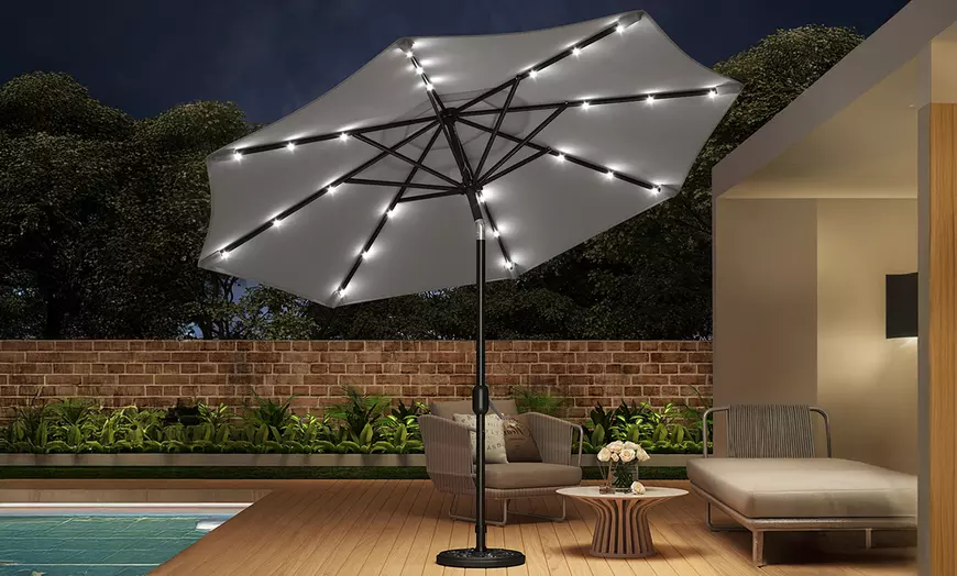 Image 13: Rotatable Solar Strip Lighting Umbrella with Fillable Base